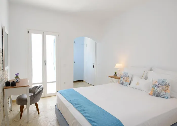 Tholariani أمورجوس